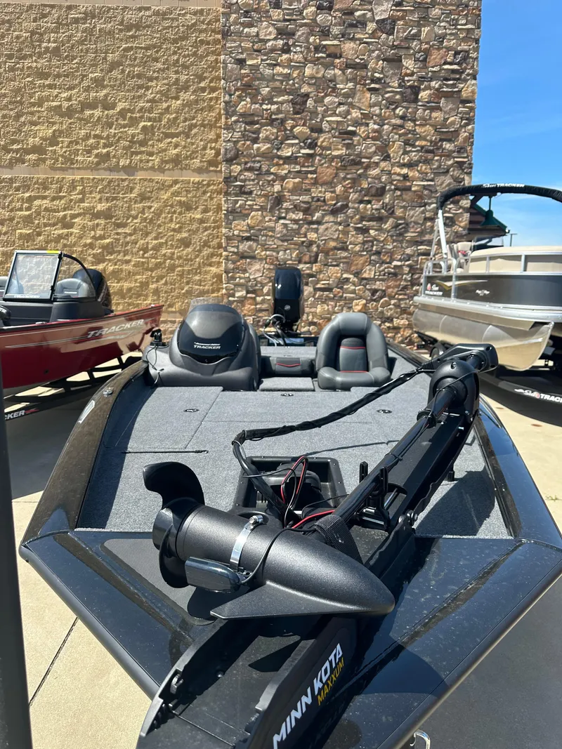 Slide: The Image of 2024 Tracker Pro Team 175 TXW fishing boat with Minn Kota trolling motor. - 2