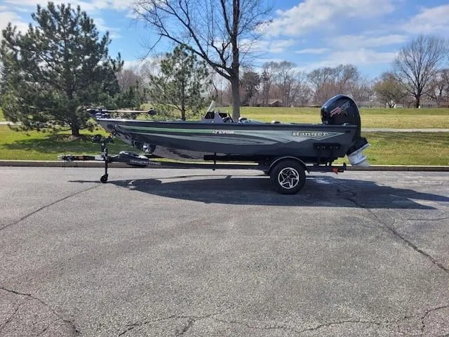 The Image of 2024 Ranger VS1782SC Angler boat on trailer in outdoor setting. - 0
