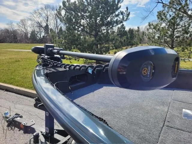 Slide: The Image of 2024 Ranger VS1782SC Angler boat with trolling motor in a park setting. - 4