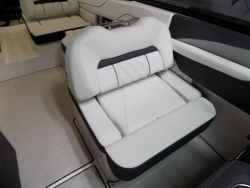 Slide: The Image of 2024 Regal LX2 boat interior with luxurious white seating and modern design. - 6