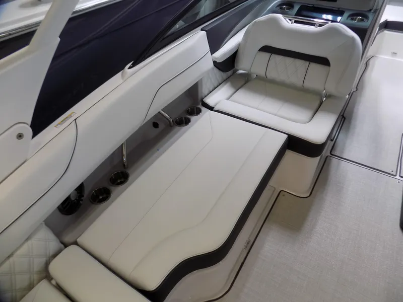 Slide: The Image of 2024 Regal LX2 boat interior with luxurious white seating and modern design. - 8