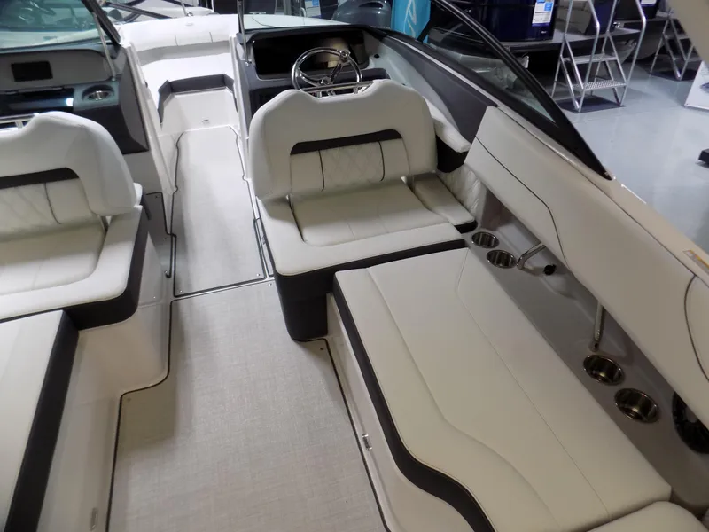 Slide: The Image of 2024 Regal LX2 boat interior with luxurious white seating and modern design. - 9