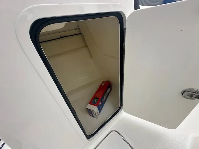 Slide: The Image of Storage compartment on a 2022 Bayliner VR4 Bowrider OB boat. - 17