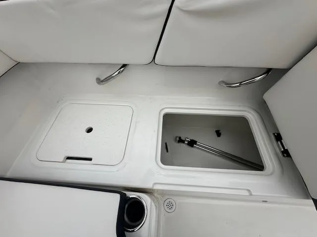 Slide: The Image of 2022 Bayliner VR4 Bowrider OB storage compartments and seating area. - 25