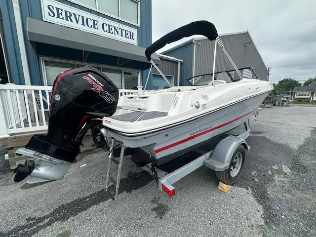 Slide: The Image of 2022 Bayliner VR4 Bowrider OB at service center, rear view with outboard motor. - 6