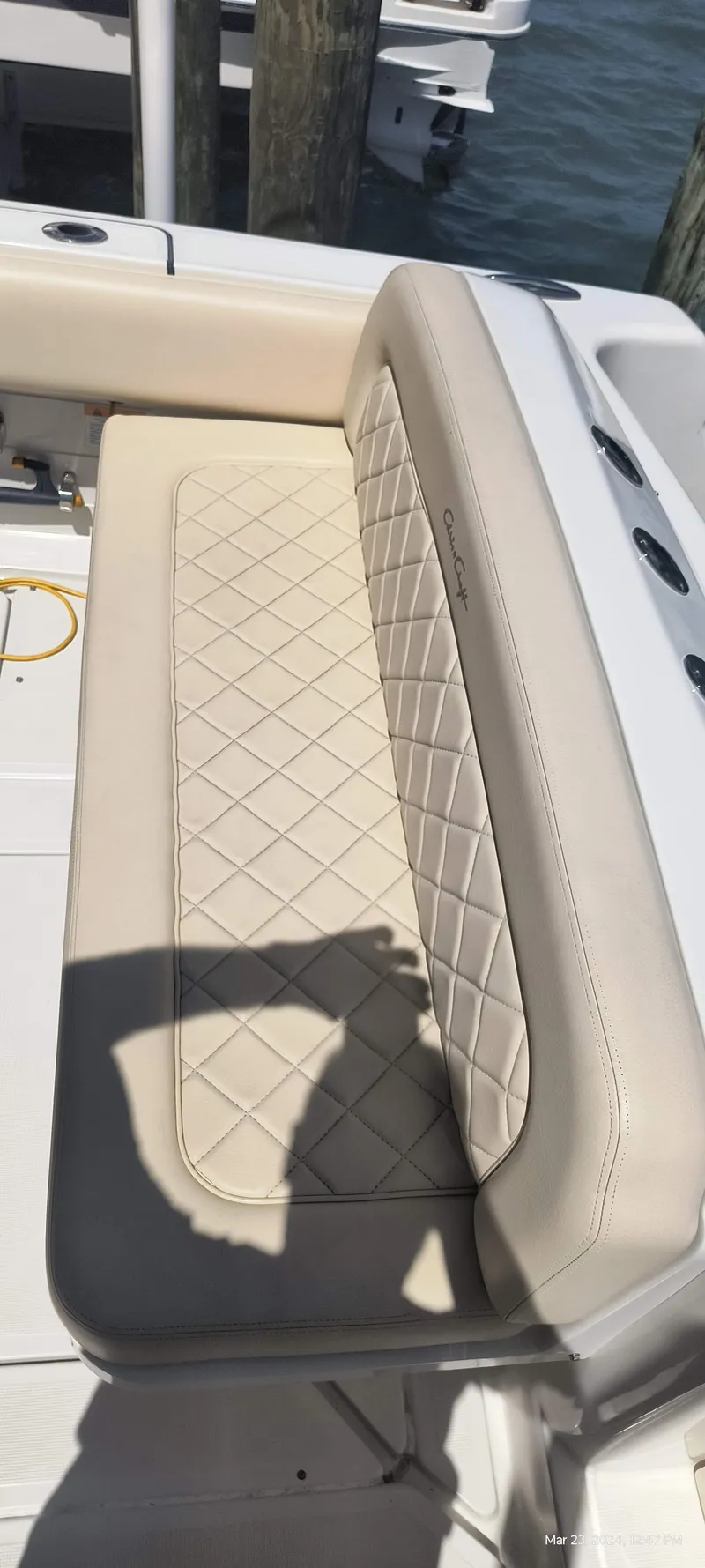 Slide: The Image of 2015 Chris-Craft Catalina 29 beige diamond-stitched boat seat. - 11
