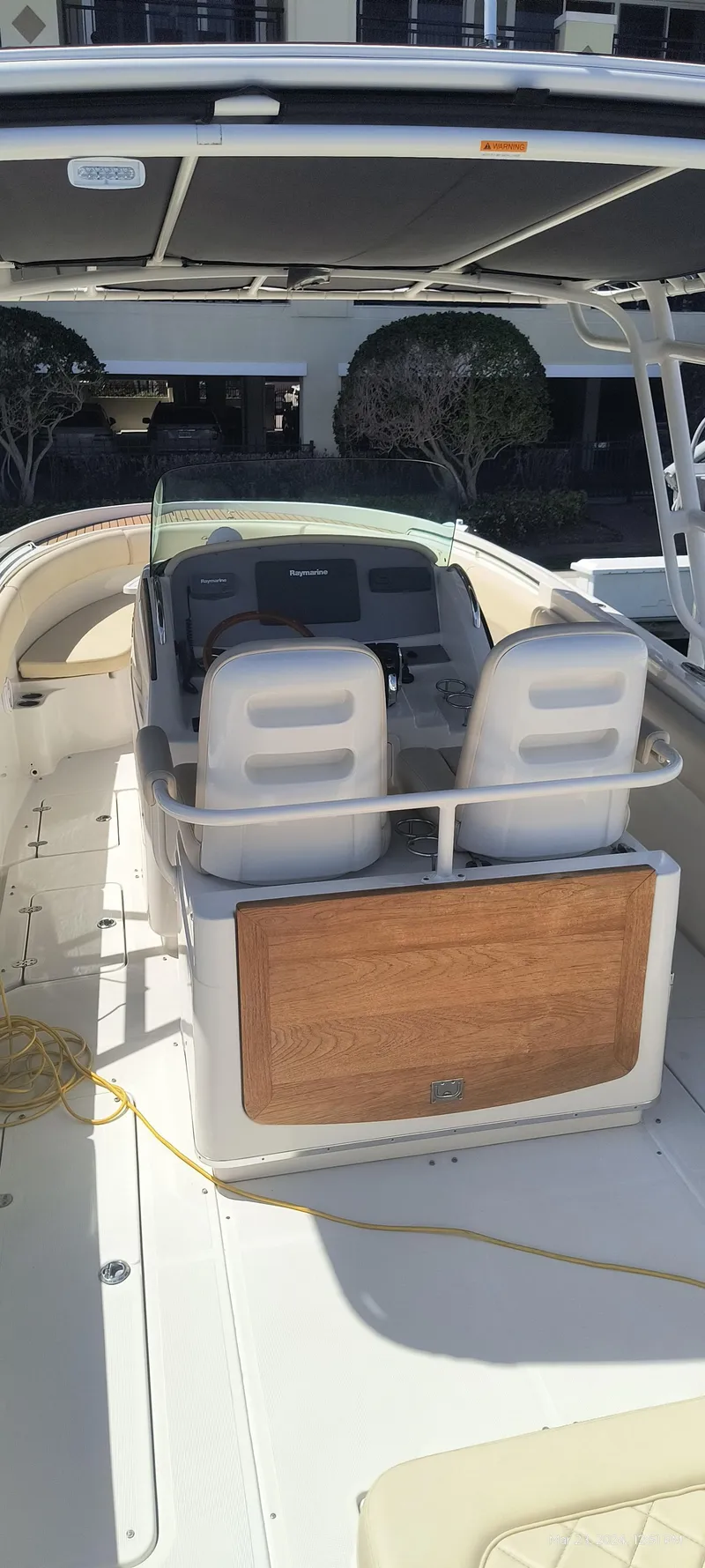 Slide: The Image of 2015 Chris-Craft Catalina 29 boat interior with dual seats and helm station. - 15