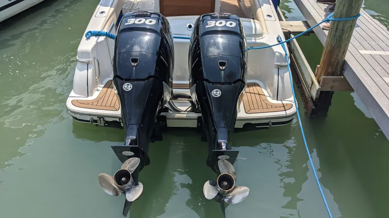 Slide: The Image of 2015 Chris-Craft Catalina 29 with twin 300 horsepower outboard engines docked. - 19