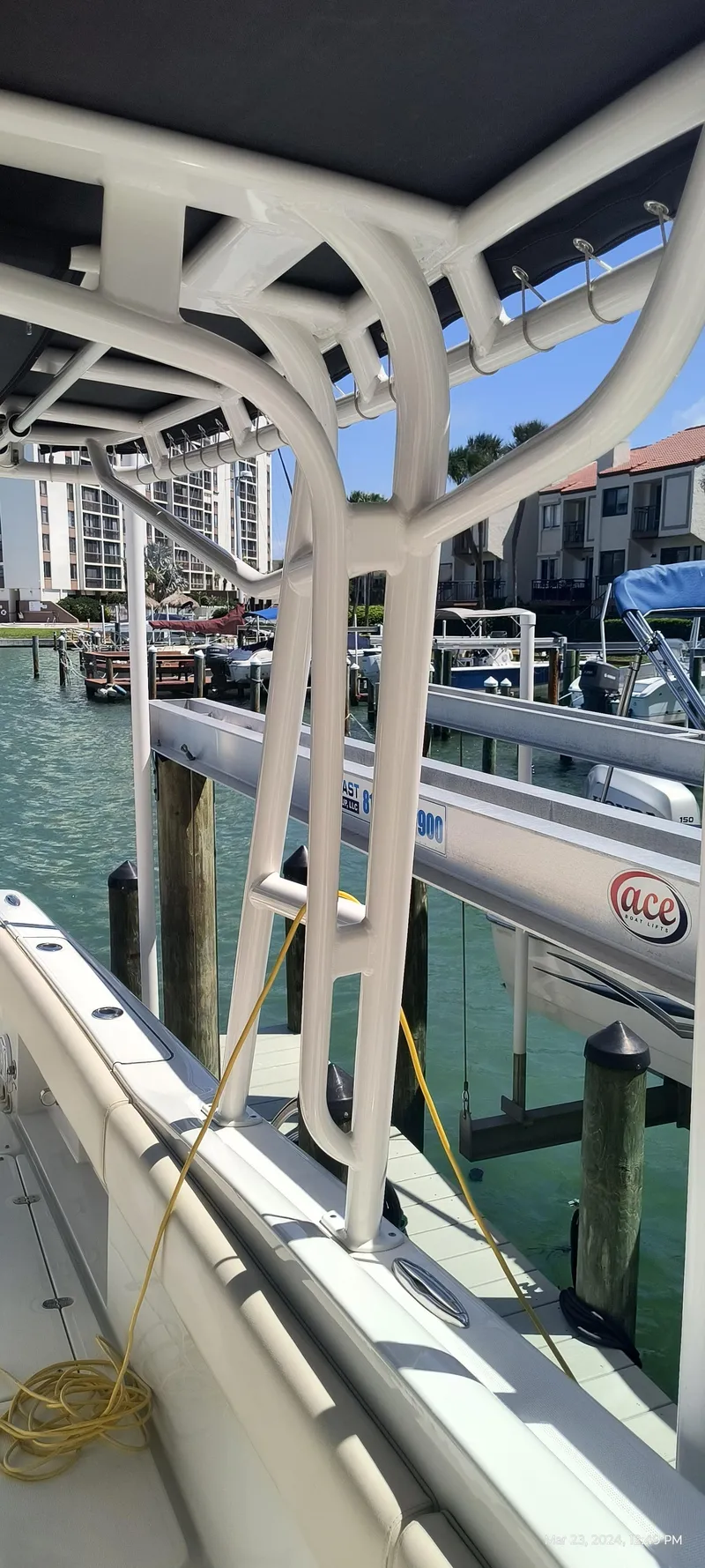 Slide: The Image of 2015 Chris-Craft Catalina 29 docked at a marina with waterfront buildings. - 31