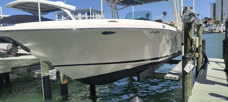 Slide: The Image of 2015 Chris-Craft Catalina 29 boat docked at a marina. - 4