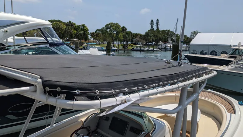 Slide: The Image of 2015 Chris-Craft Catalina 29 boat docked at a marina. - 44