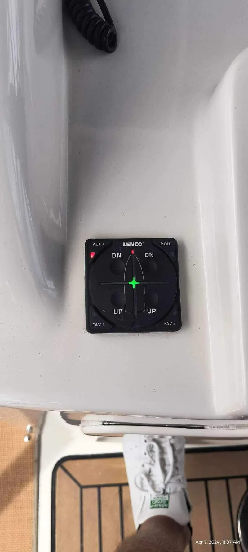 Slide: The Image of 2015 Chris-Craft Catalina 29 boat control panel with trim tab switches. - 49