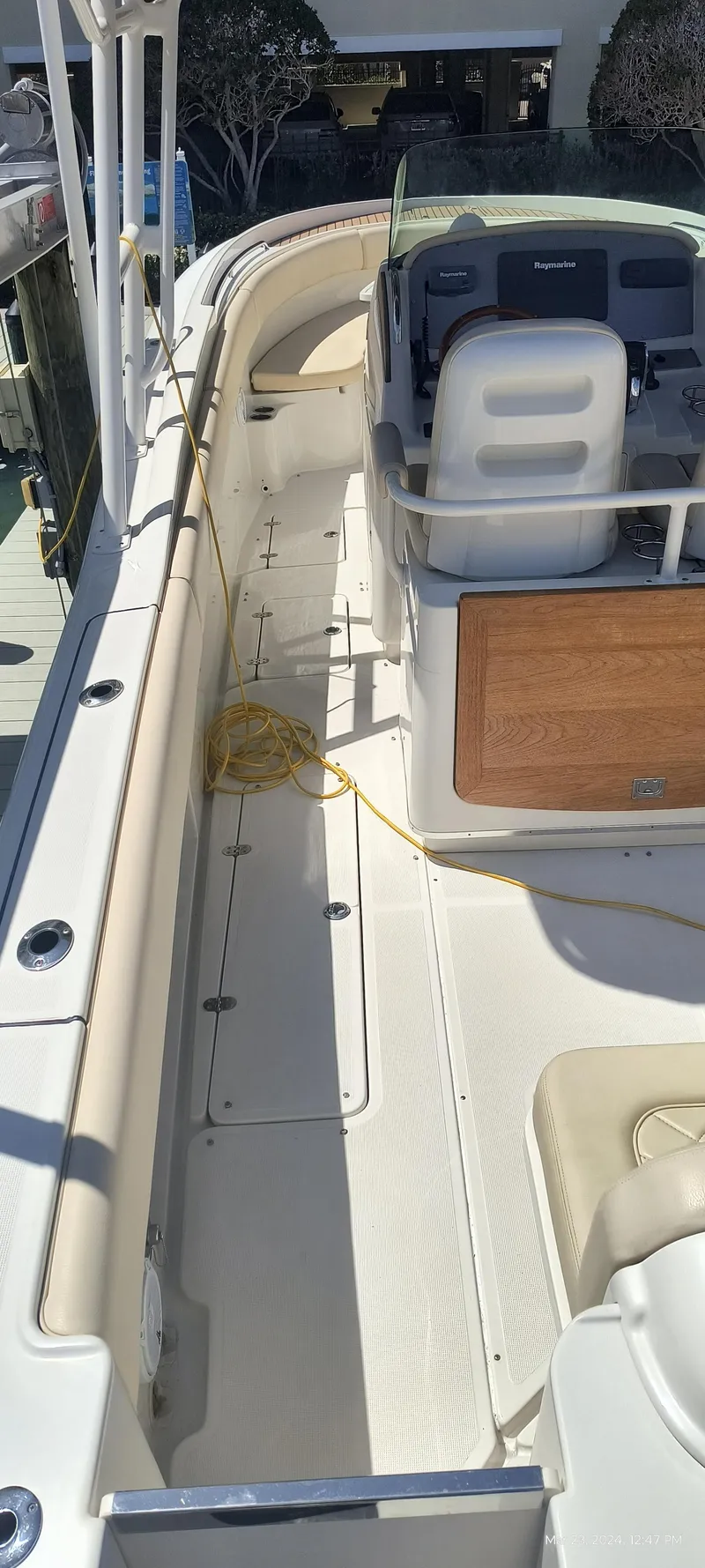 Slide: The Image of 2015 Chris-Craft Catalina 29 boat interior with seating and helm station. - 7