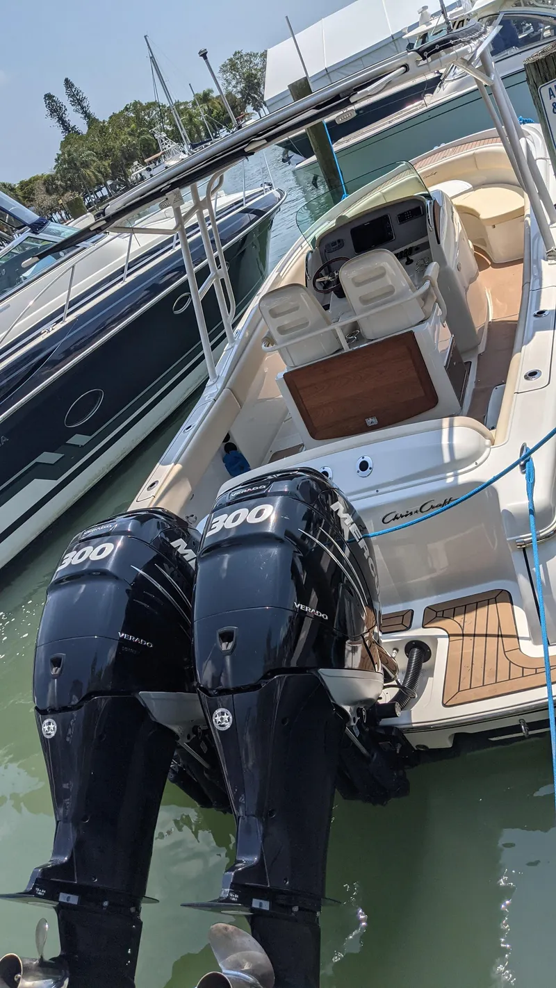 Slide: The Image of 2015 Chris-Craft Catalina 29 boat docked with twin 300 HP engines. - 9