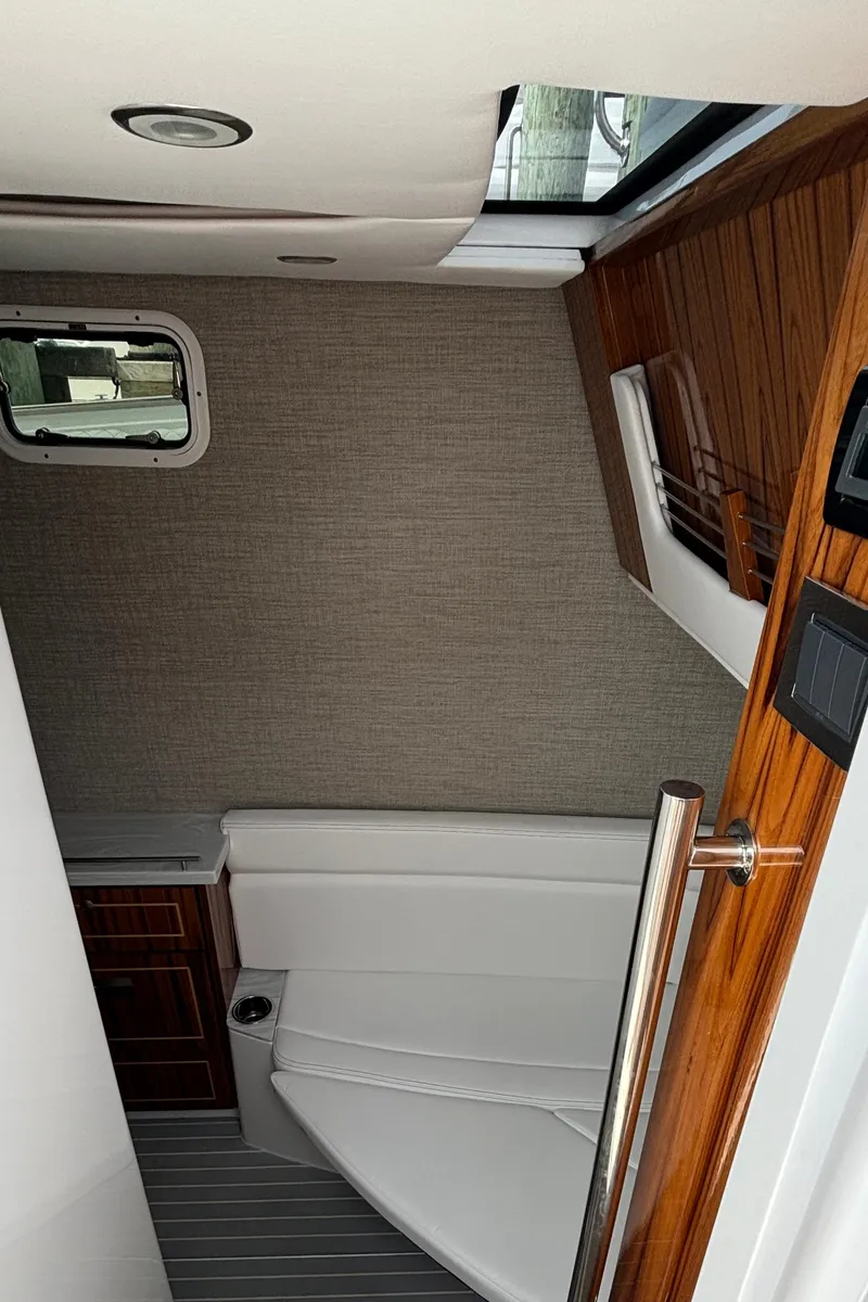 Slide: The Image of Interior cabin of 2024 HCB 42 Lujo boat with modern design. - 25