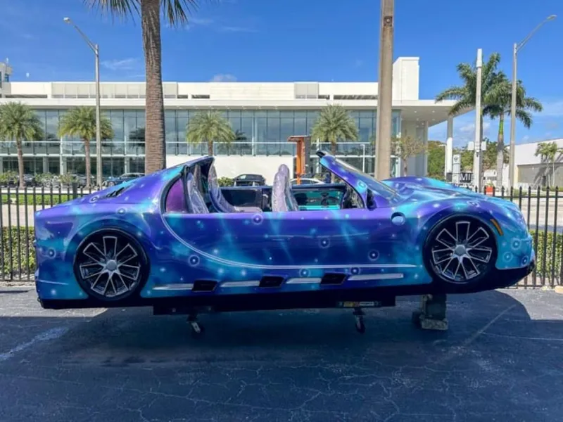 The Image of 2023 Watersports Car Series B with custom blue and purple paint job on display. - 0