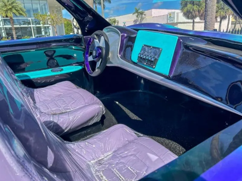 Slide: The Image of 2023 Watersports Car Series B interior with purple seats and modern dashboard. - 4