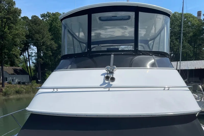 Slide: The Image of 2002 Carver 444 Cockpit Motoryacht docked, front view. - 39