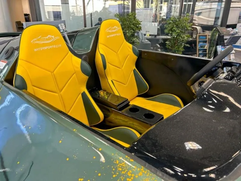 Slide: The Image of 2023 Watersports Car Series X interior with yellow and black seats. - 4