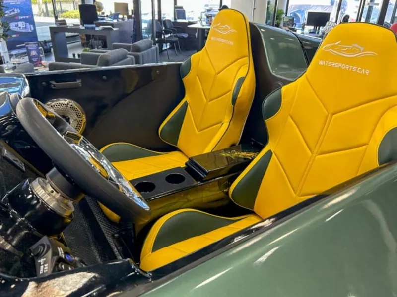 Slide: The Image of Interior of 2023 Watersports Car Series X with yellow and green seats. - 5