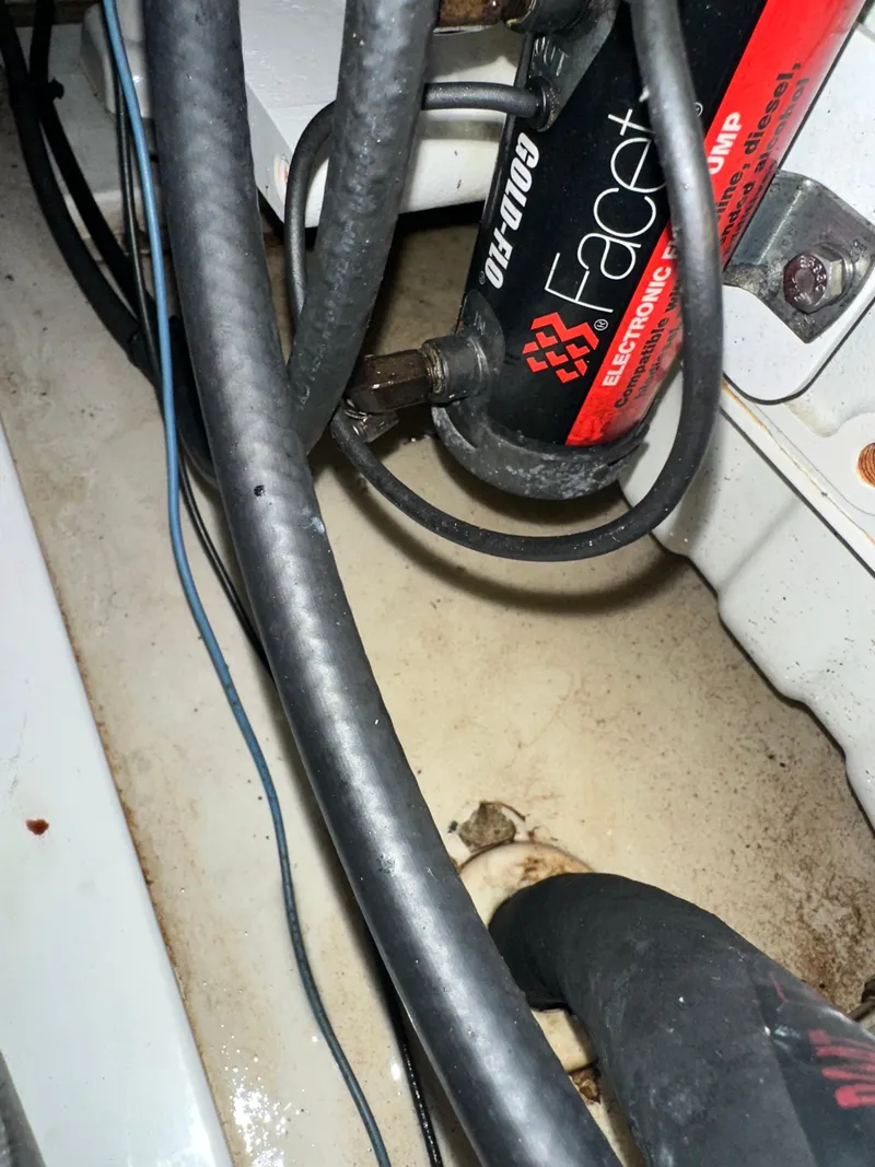 Slide: The Image of Close-up of engine compartment in 2001 Uniesse 42 Open boat. - 10