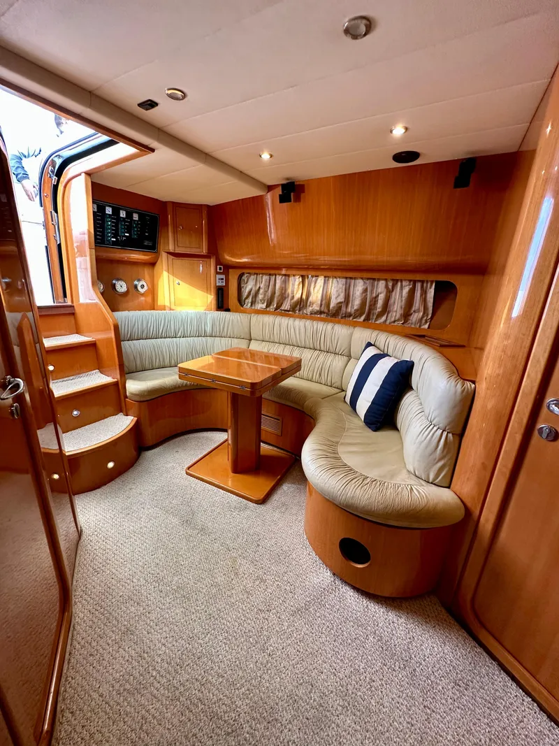 Slide: The Image of Interior of 2001 Uniesse 42 Open yacht with cozy seating area. - 28