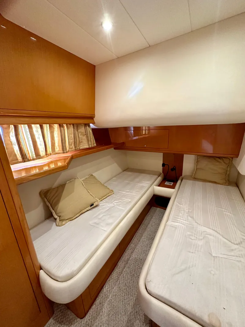 Slide: The Image of Interior cabin of a 2001 Uniesse 42 Open yacht with twin beds. - 38