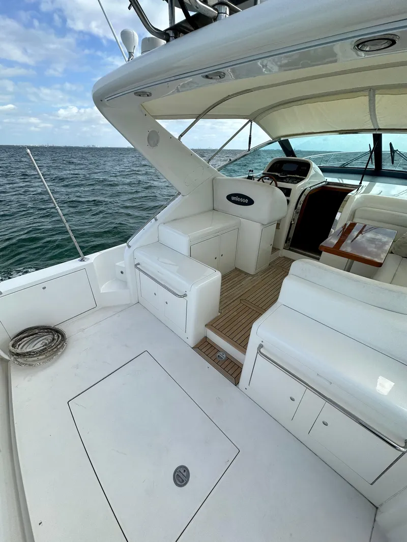 Slide: The Image of 2001 Uniesse 42 Open yacht with spacious deck and ocean view. - 46