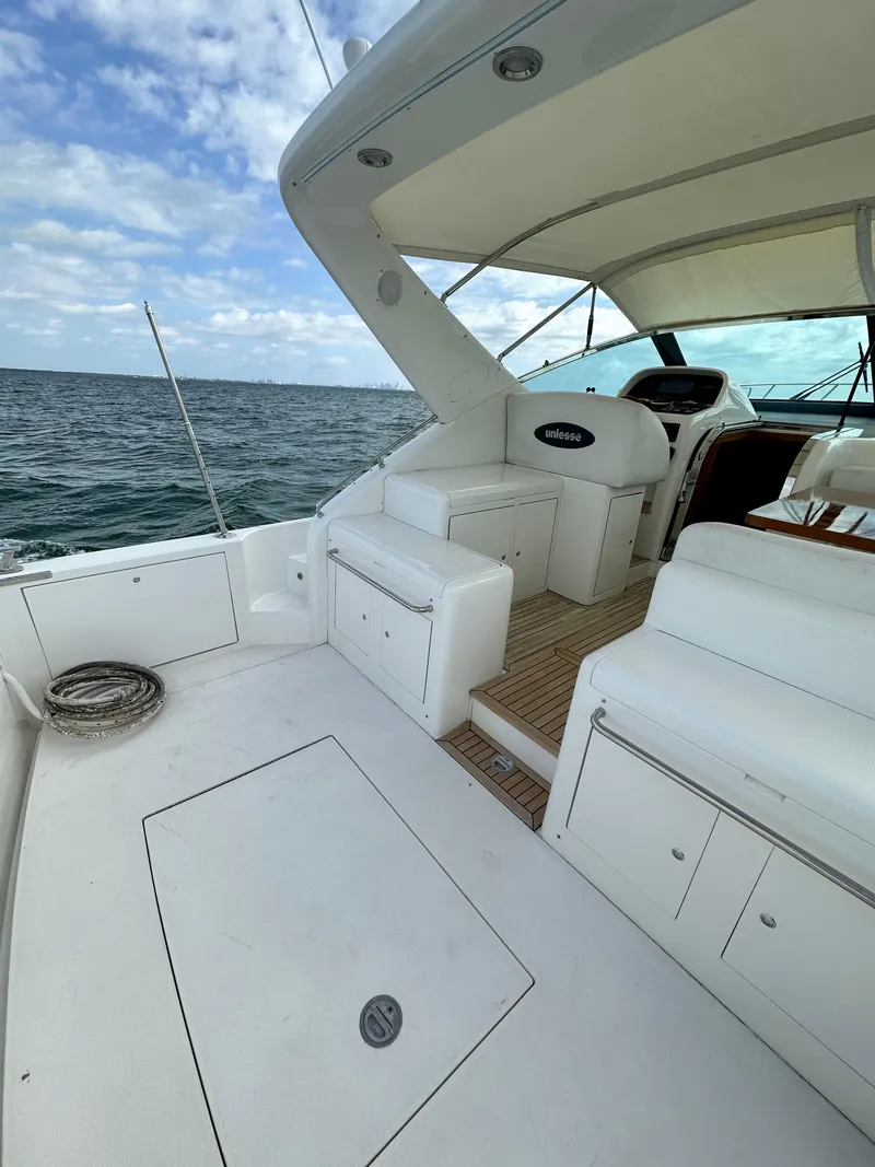 Slide: The Image of 2001 Uniesse 42 Open yacht with spacious deck and ocean view. - 48