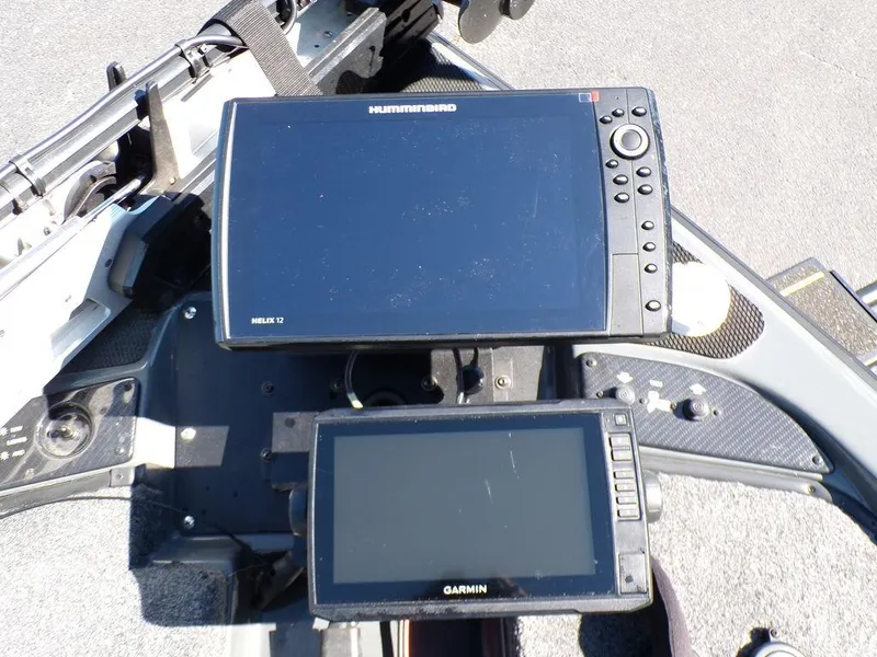 Slide: The Image of Dual fish finders on a 2023 Phoenix 920 Elite boat. - 18