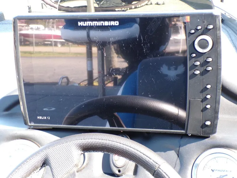Slide: The Image of Humminbird Helix 12 fish finder on Phoenix 920 Elite 2023 boat dashboard. - 19