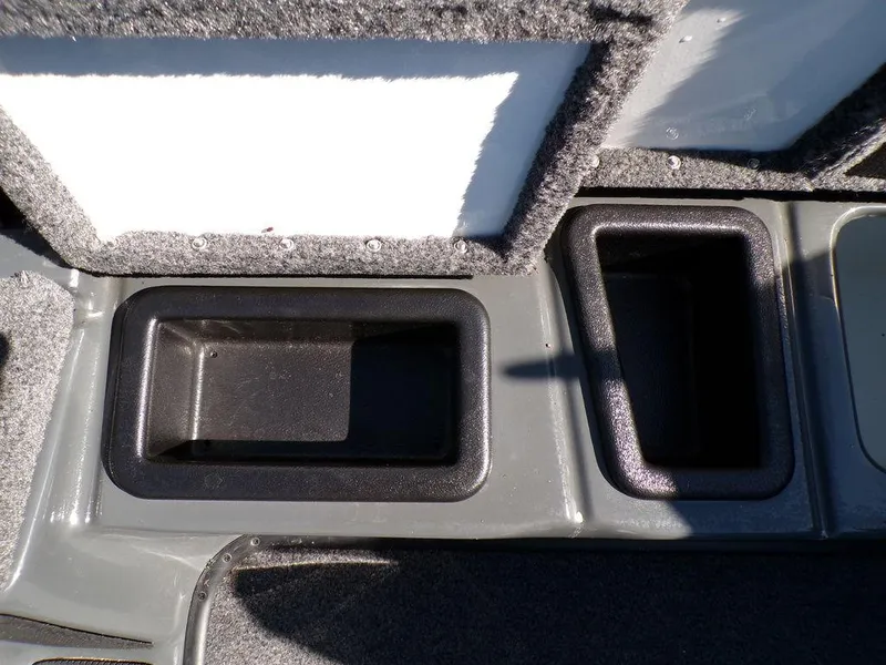 Slide: The Image of Storage compartments in a 2023 Phoenix 920 Elite boat. - 29