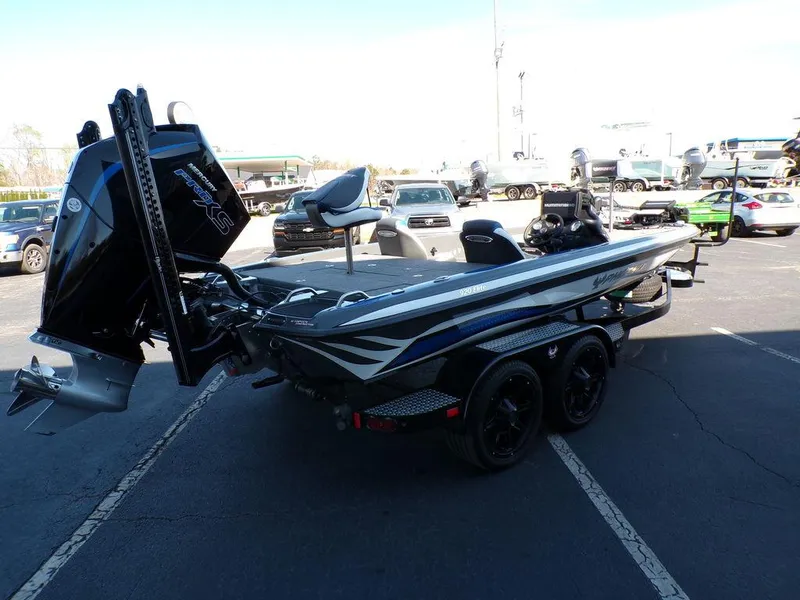 Slide: The Image of 2023 Phoenix 920 Elite bass boat on trailer in parking lot. - 4
