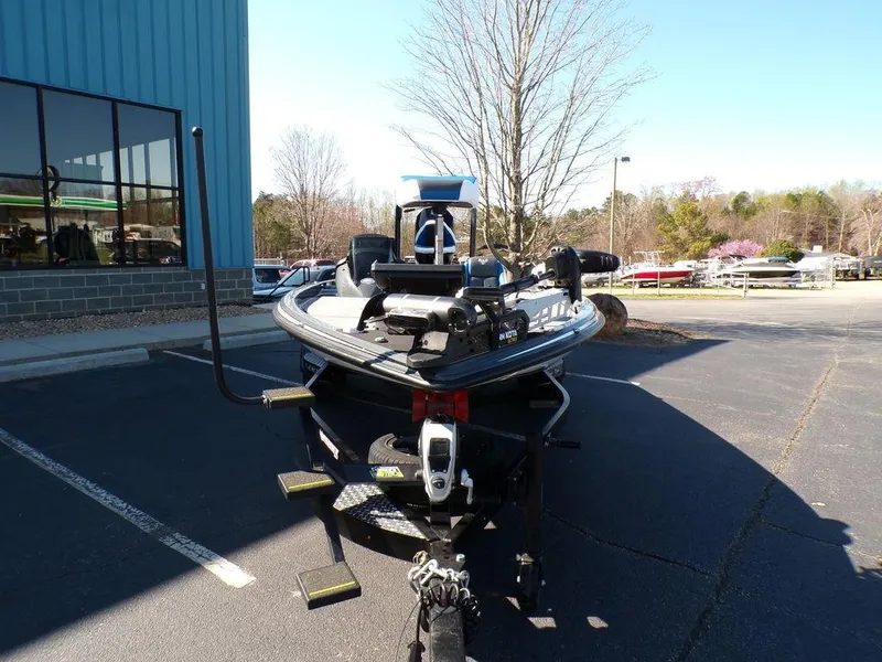Slide: The Image of 2023 Phoenix 920 Elite boat on trailer in parking lot. - 7