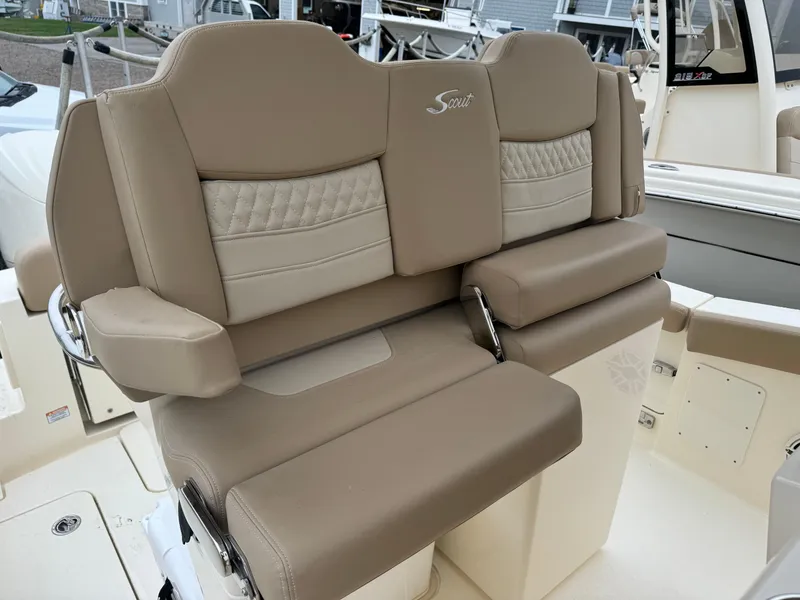 Slide: The Image of 2025 Scout 260 LXF boat with luxurious tan seating. - 28