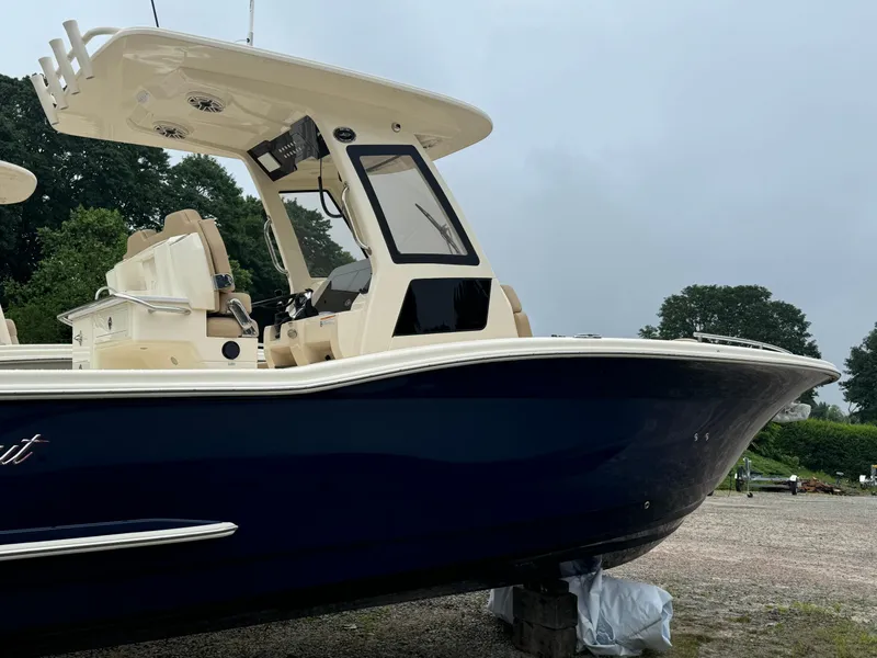 Slide: The Image of 2025 Scout 260 LXF boat with sleek design on display. - 5