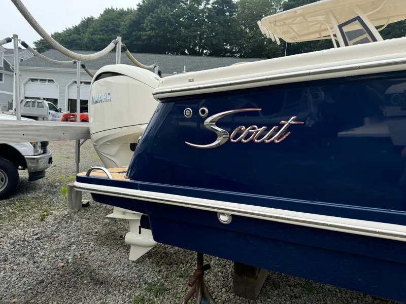Slide: The Image of 2025 Scout 260 LXF boat with Yamaha engine in a boatyard. - 6