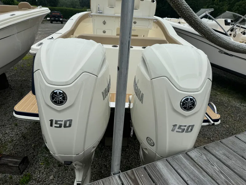 Slide: The Image of 2025 Scout 260 LXF with twin Yamaha 150 outboard engines. - 8