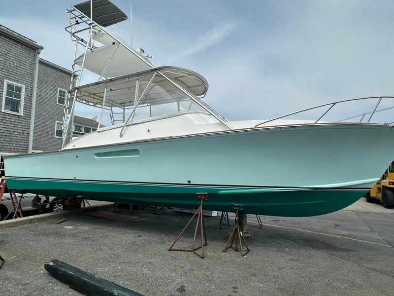 Slide: The Image of 2004 Stolper 38 boat on dry dock for maintenance. - 2
