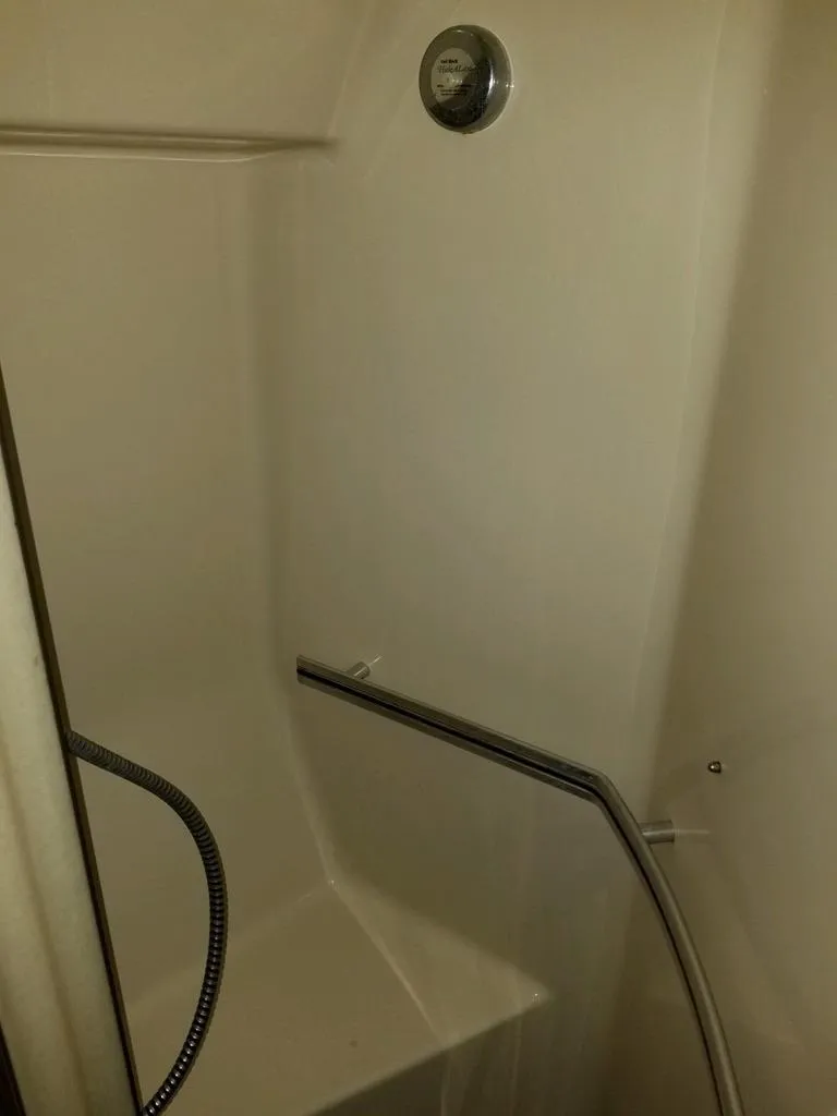 Slide: The Image of 1986 Sea Ray 390 Express shower with handrail and showerhead. - 6