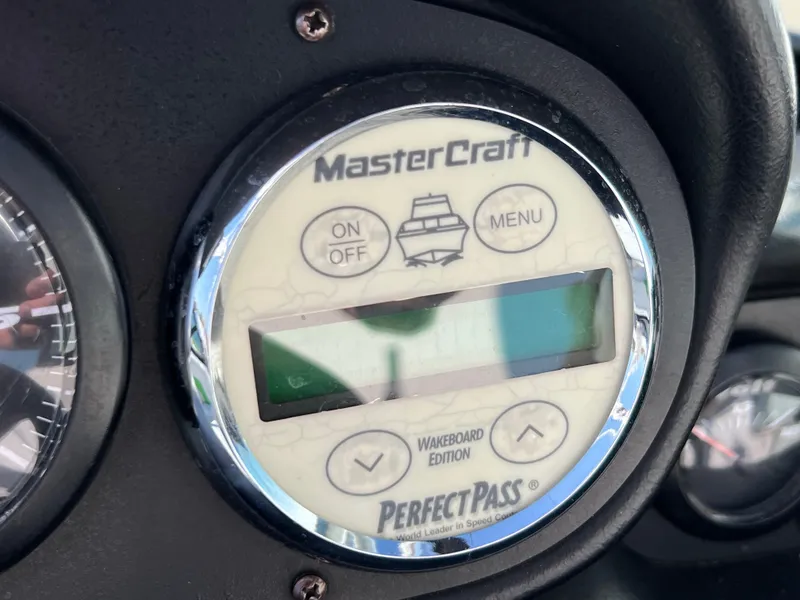 Slide: The Image of Close-up of 2003 MasterCraft X5 PerfectPass wakeboard edition control panel. - 4