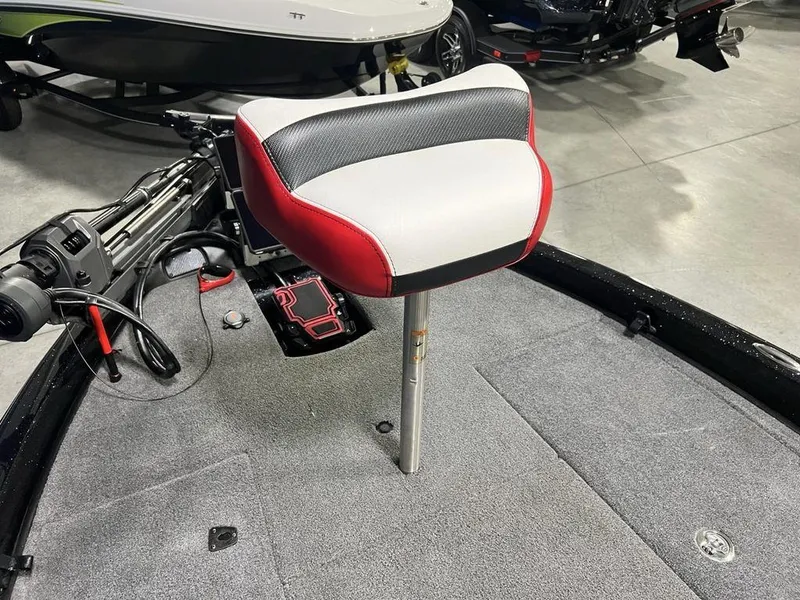 Slide: The Image of 2022 Phoenix 919 Pro XP boat seat with red and white upholstery. - 12