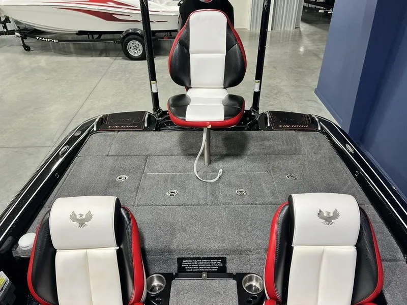 Slide: The Image of 2022 Phoenix 919 Pro XP boat interior with three seats and carpeted deck. - 15