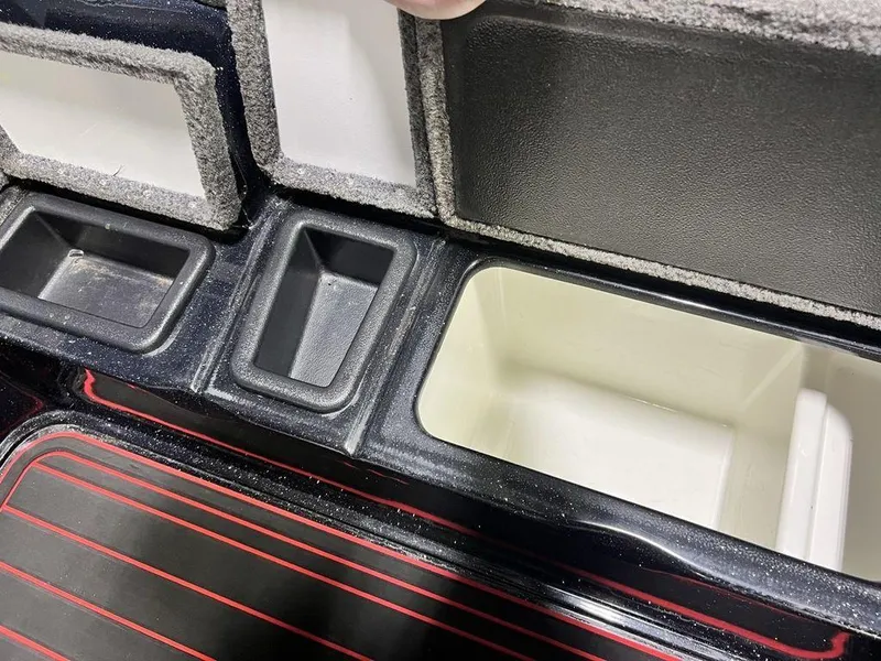 Slide: The Image of Phoenix 919 Pro XP 2022 storage compartments with open lids, showcasing interior design. - 16