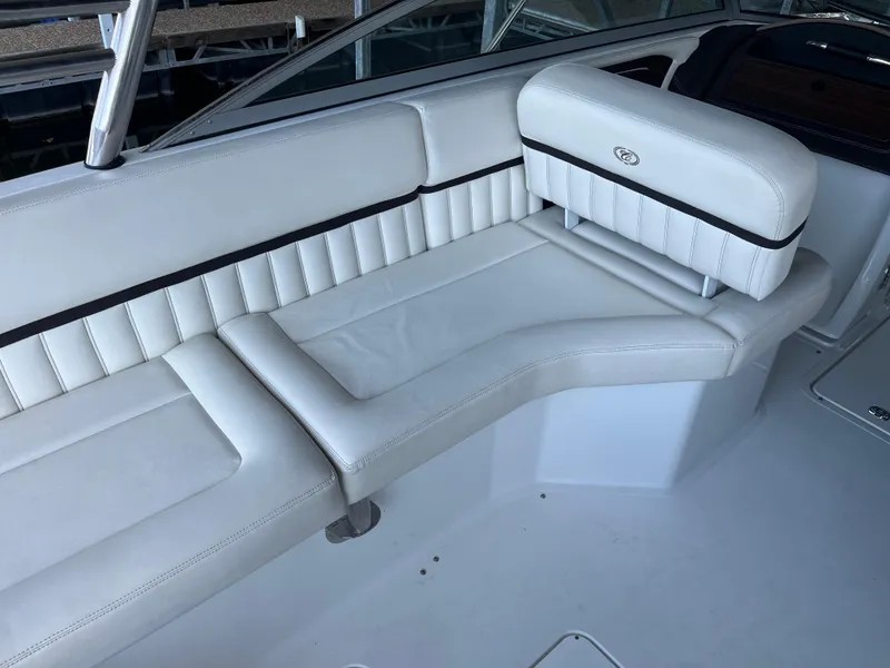 Slide: The Image of 2013 Cobalt A28 boat interior with white leather seating. - 6