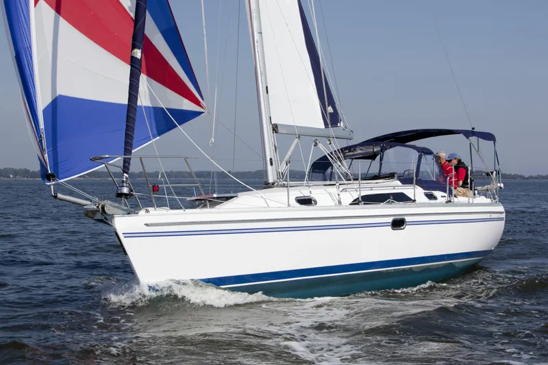 Slide: The Image of 2024 Catalina 355 sailboat cruising on open water. - 0