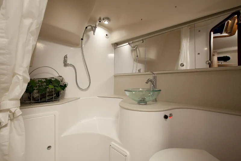 Slide: The Image of Modern bathroom in 2024 Catalina 355 yacht with glass sink and shower. - 7