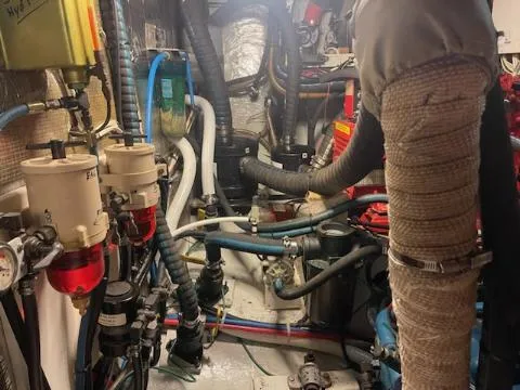 Slide: The Image of Engine room of a 1969 Spencer 44 CC boat with various mechanical components. - 3