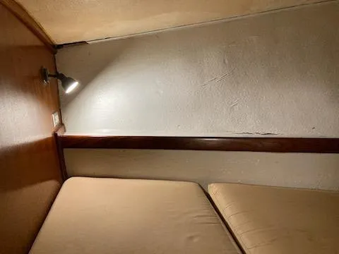 Slide: The Image of Cozy cabin bed in a 1969 Spencer 44 CC sailboat. - 40