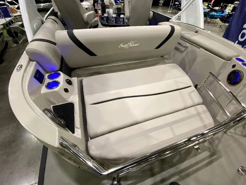 Slide: The Image of 2024 SunChaser Calais 23 SB DC boat interior with plush seating and modern amenities. - 19